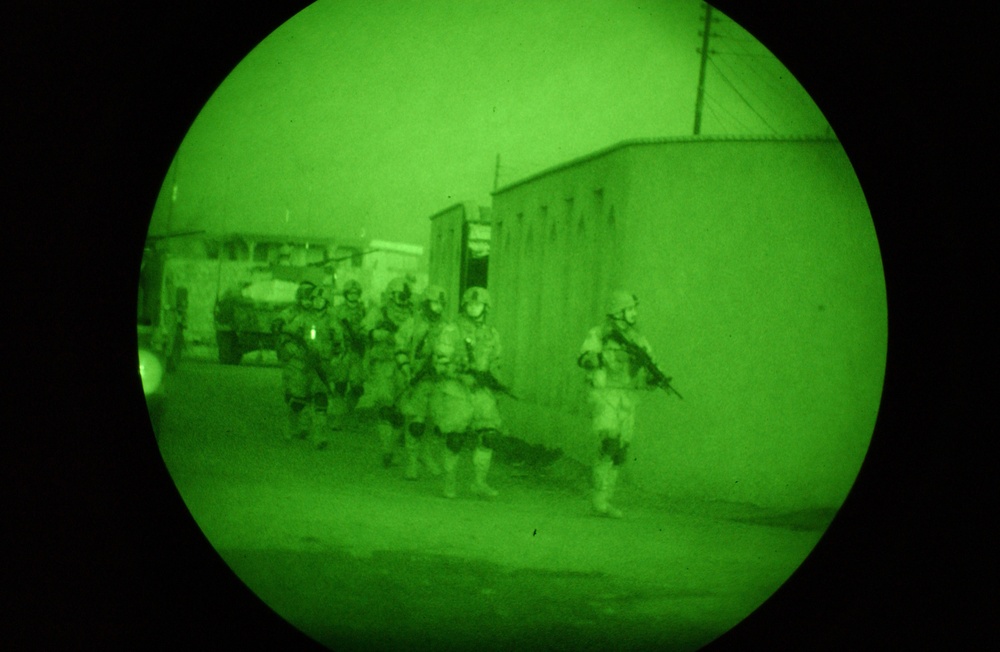 A Soldier keeps an eye out for any suspicious activity