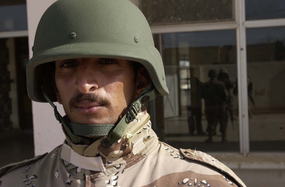 An Iraqi Army soldier provides security