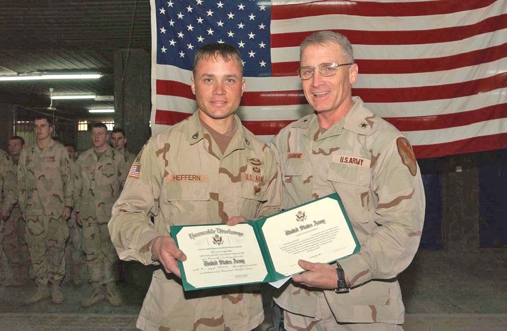 Brig. Gen. Jeffrey Hammond Poses With SSgt. Seth Heffern