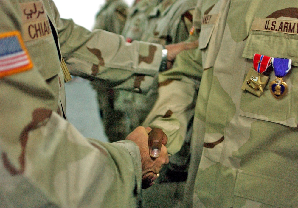 Maj. Gen. Peter Chiarelli offers up a handshake