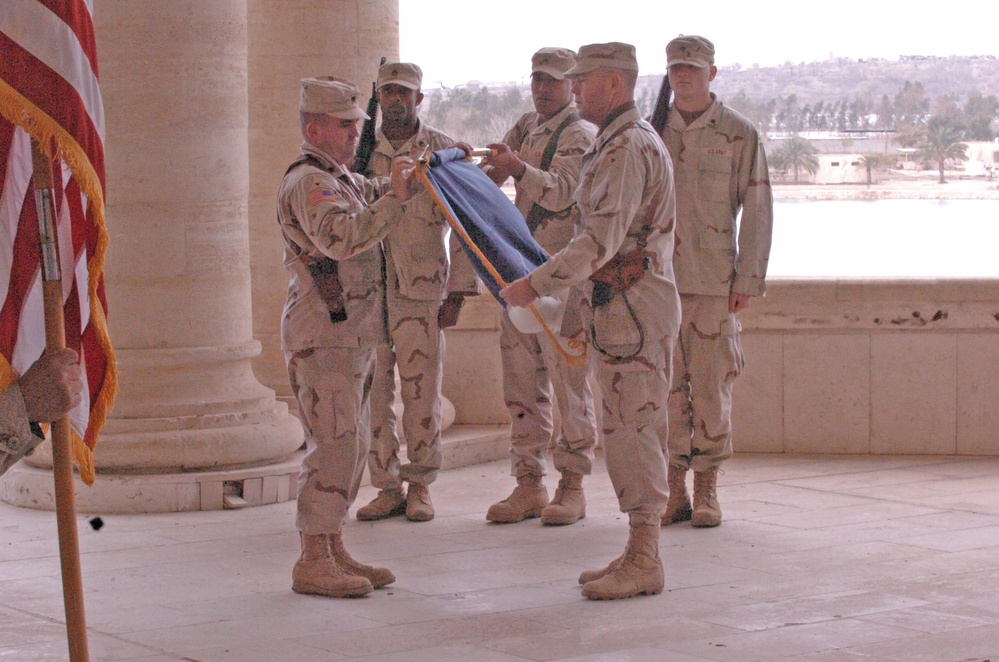 Lt. Col. Raymond Lacey rolls his units guidon