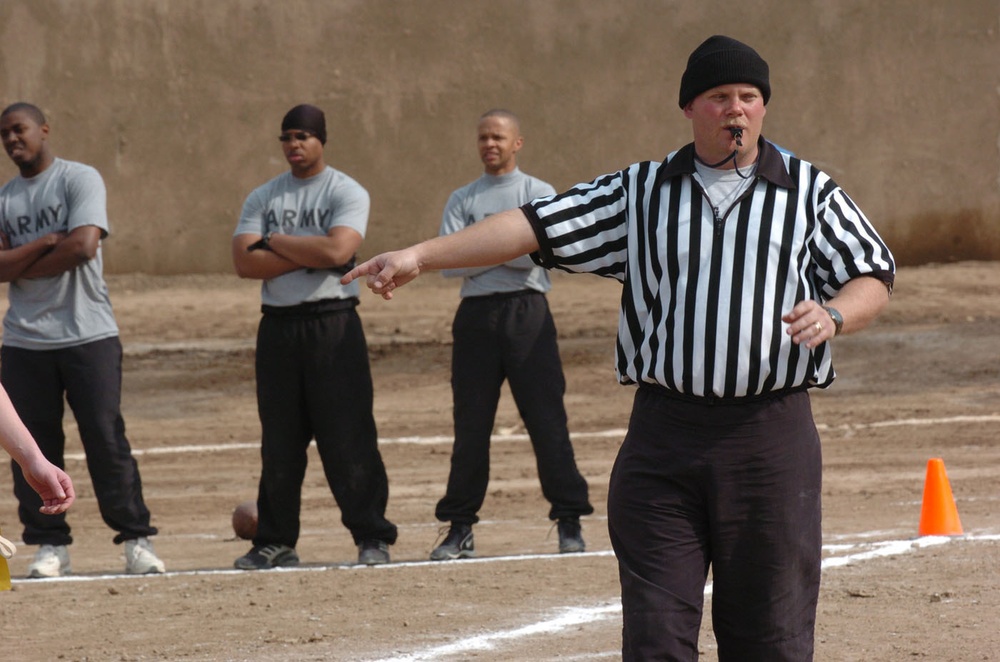 SFC W. Bryan Costello blows the whistle to begin play