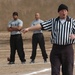 SFC W. Bryan Costello blows the whistle to begin play