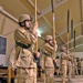 Soldiers hold the cased colors during the TOA ceremony