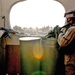 Pfc. Malcolm Ackers and his counterpart watch a street