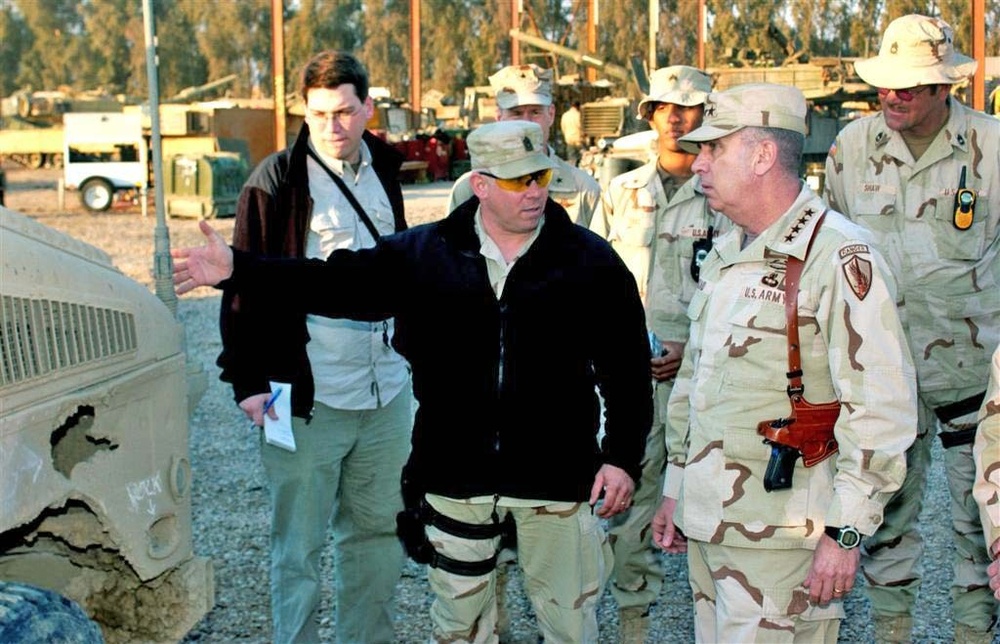 Sgt.Maj. Stuckey shows where a rocket propelled grenade entered