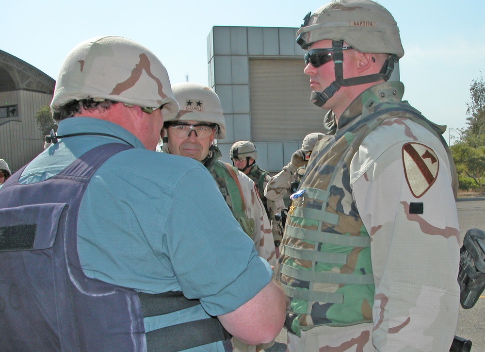 Carl Payne pins the Silver Star medal on his son