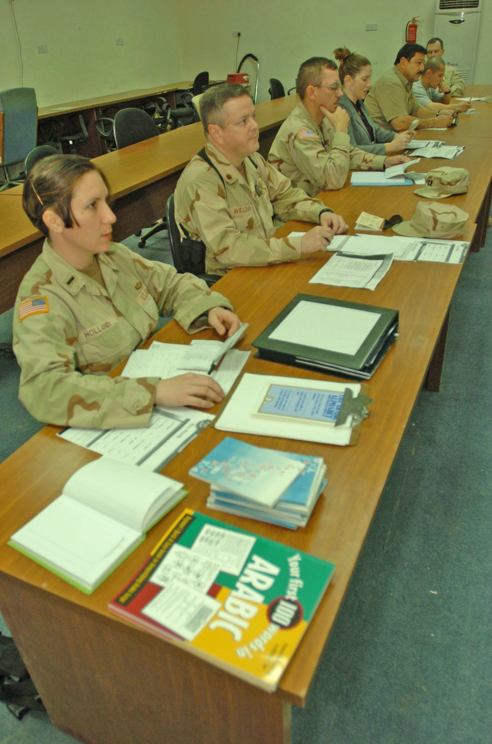 Students learn basic Arabic phrases and writing