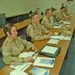 Students learn basic Arabic phrases and writing