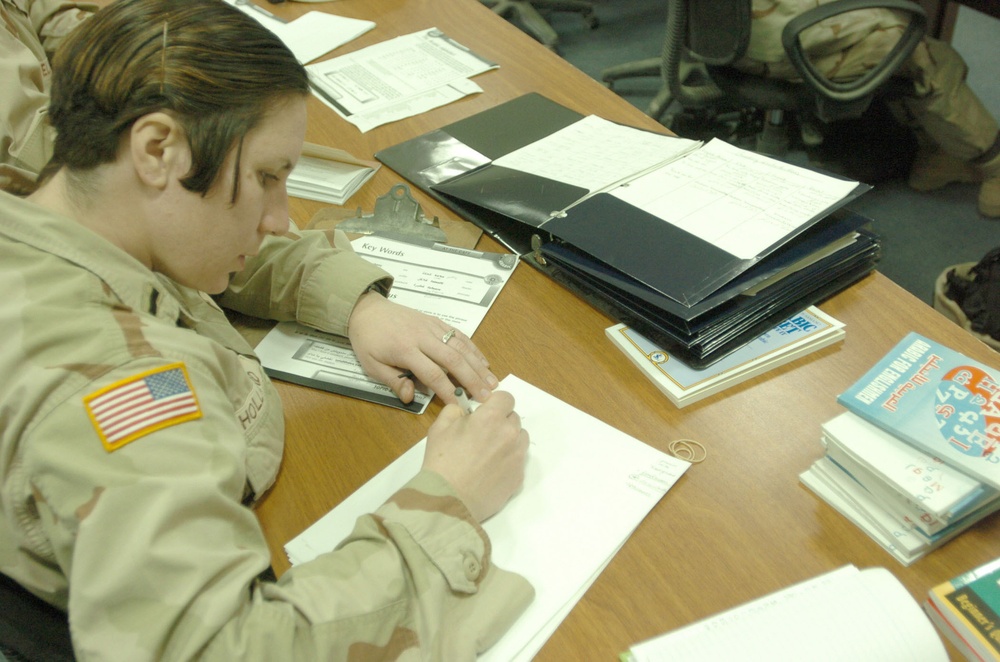 1st Lt. Holland takes notes during an Arabic language class