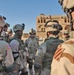 Sgt. William Thomas briefs his soldiers