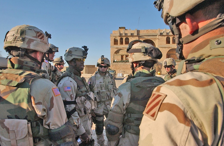 Sgt. William Thomas briefs his soldiers