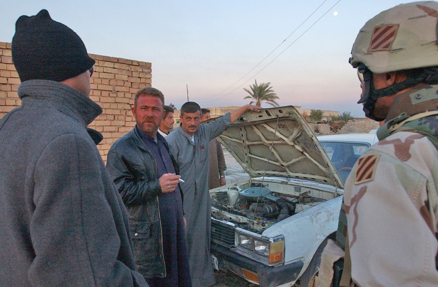 Sgt. 1st Class Dewayne Sparks Speaks to Iraqi Civilians