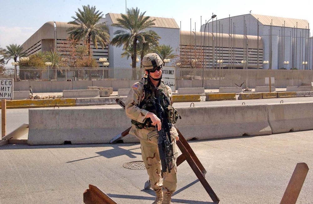 Pfc. Strong moves a barrier allowing a vehicle to pass through