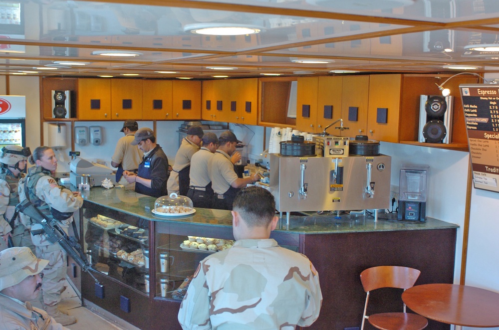 Soldiers stand in line at the Green Bean Coffee shop