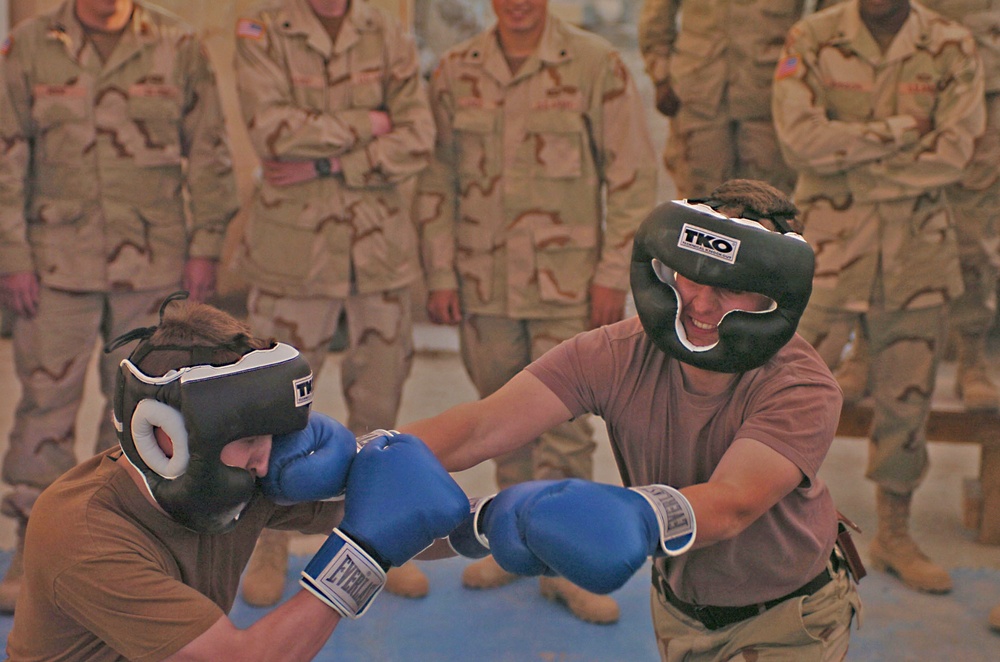 Sgt. Meyers lands a jab on Spc. Christopher Mauro