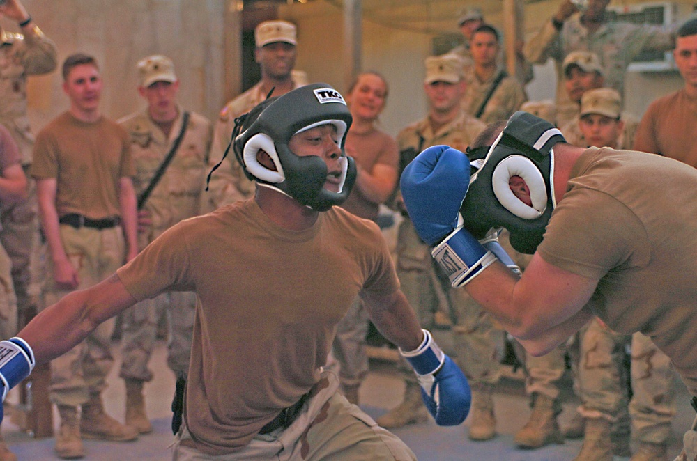 Pvt. Joseph throws a right hook at Pfc. Michael Carr