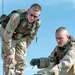Soldiers check a weapon mount before leaving