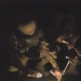 Soldiers inspect documents and money founded