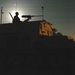 Sgt. Steve Devo mans a .50 caliber machine gun