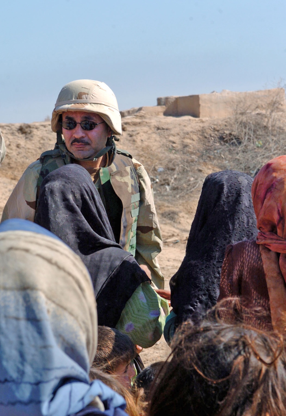 Linguist Mahir Ibrahimov Talks With Children in a Local Village
