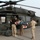 Medics Load a Casualty Onto a MEDEVAC Blackhawk Helicopter
