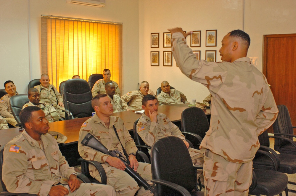 SFC Robert Baskervill teaches a class on IED awareness