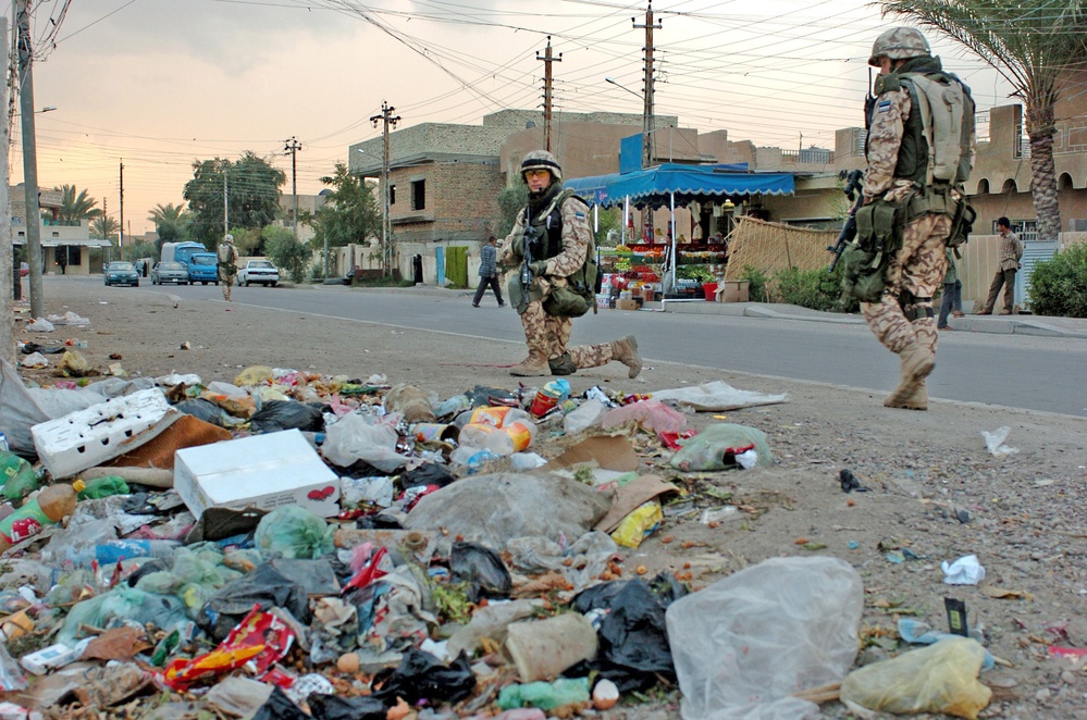 Staff Sgt. Sigmar Zelinski stands guard over an empty lot
