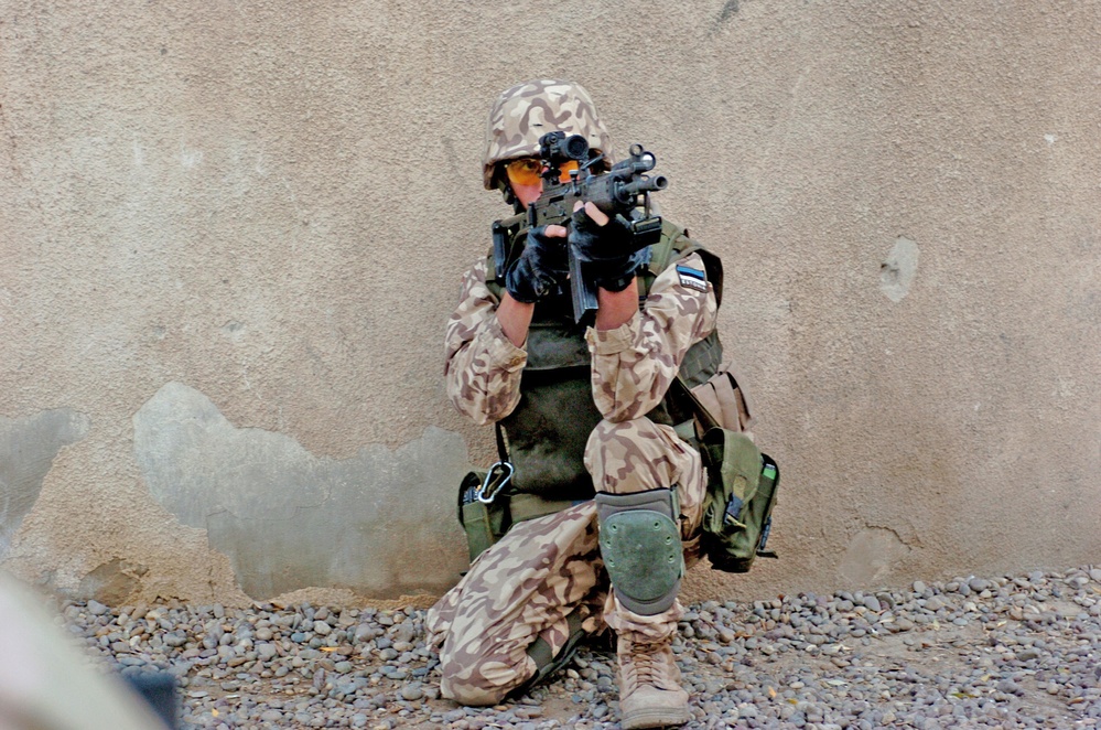 Sgt. Janar Kuningas scans rooftops of nearby buidings