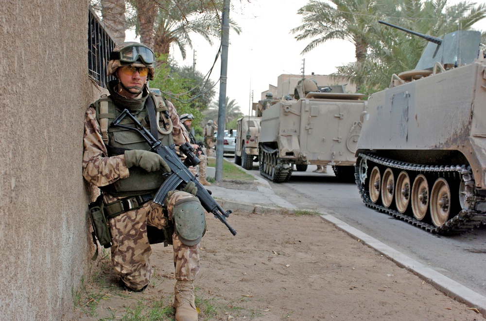 Cpl. Metsatalu holds his position while awaiting orders