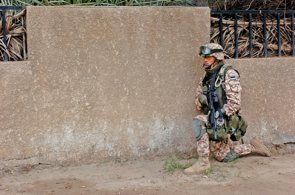 Cpl. Metsatalu holds his position while awaiting orders