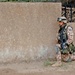 Cpl. Metsatalu holds his position while awaiting orders