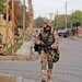 Estonian Cpl. Ranno Pettai patrols a street