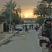 Iraqi children follow Estonian Sgt. Hardi Ansar