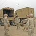 Soldiers relax and enjoy a game of hacky-sac