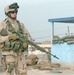 SSgt. Daniel D. Gililland provides security on the roof