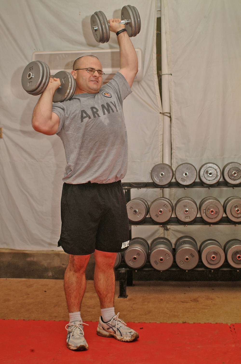Spc. Frazier pumps it up at the Camp Liberty fitness center