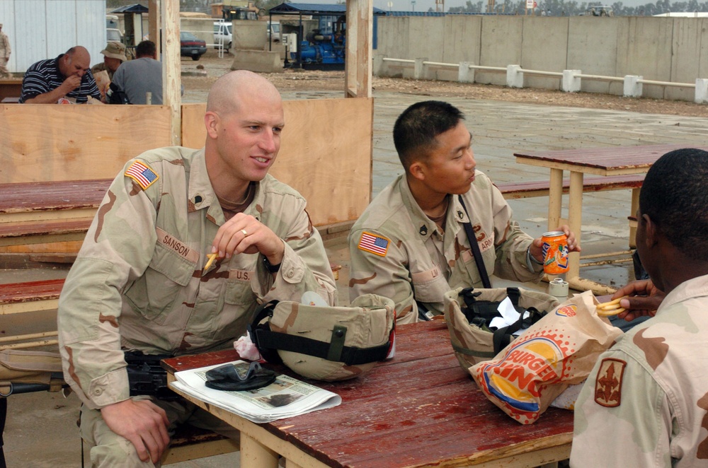 Soldiers enjoy a brief picnic at the Burger King