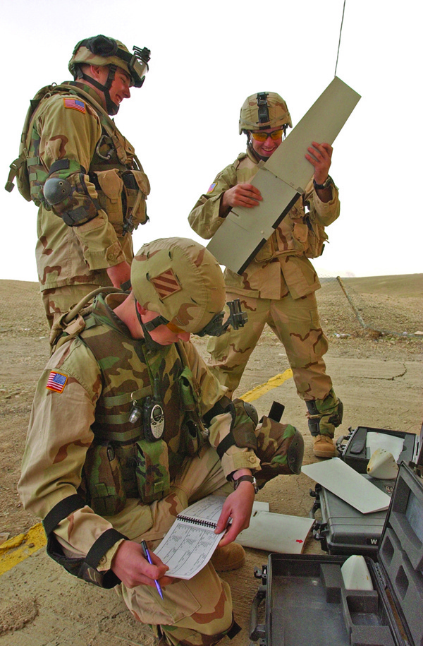 Soldiers assemble the Army smallest UAV, the Raven