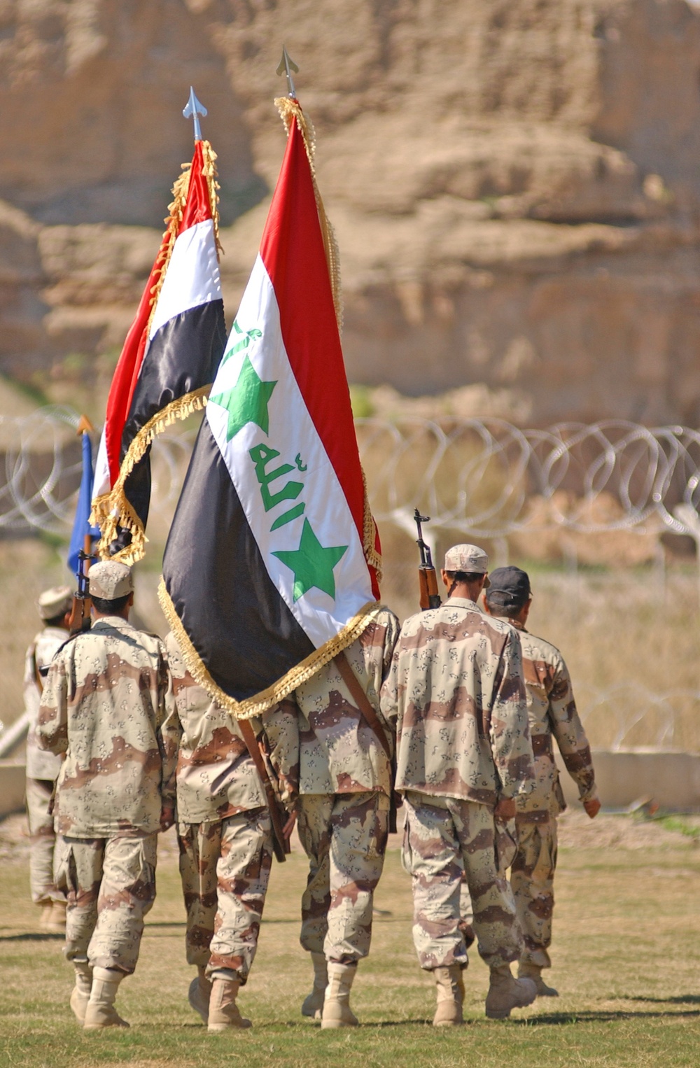 4th Iraqi Army color guard exit the parade field