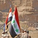 4th Iraqi Army color guard exit the parade field