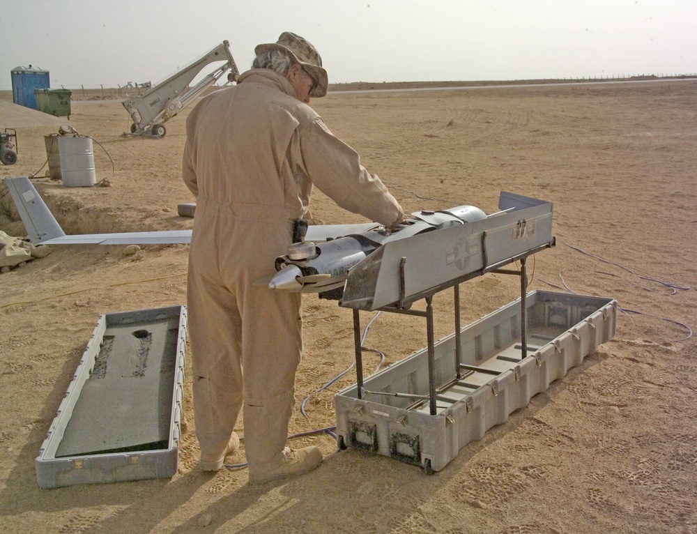 Mark Preston sets up the Scan Eagle Unmanned Aerial Vehicle