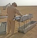 Mark Preston sets up the Scan Eagle Unmanned Aerial Vehicle