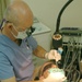 Col. Kenny performs a root canal on Maj. John McPherson