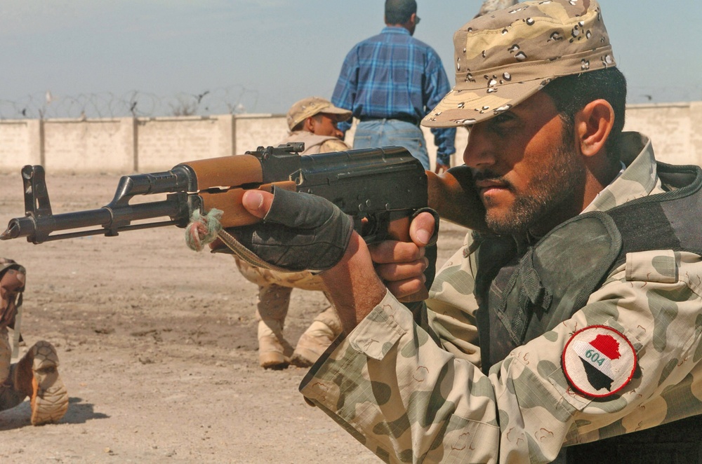 A soldier focuses on his field of fire