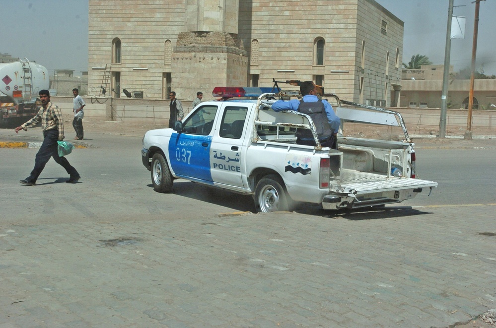 Iraqi Police pull security on the streets of Baghdad