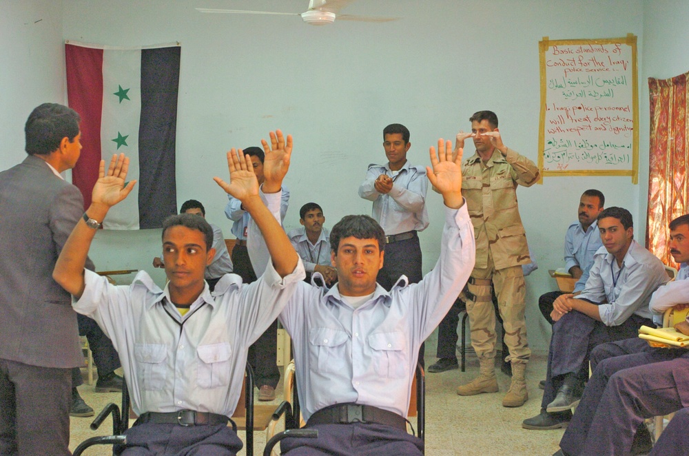 SSgt. Roger Bartow teaches a class to new Iraq Police cadets