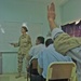 Spc. Crawford teaches a class on first aid to Iraq Police cadets