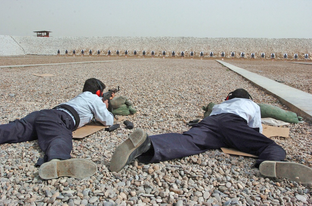 Iraq Police cadets fire AK-47s