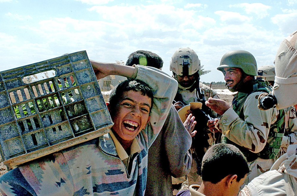 An Iraqi boy poses for a picture